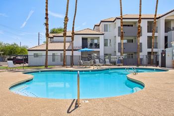 White apartment with pool